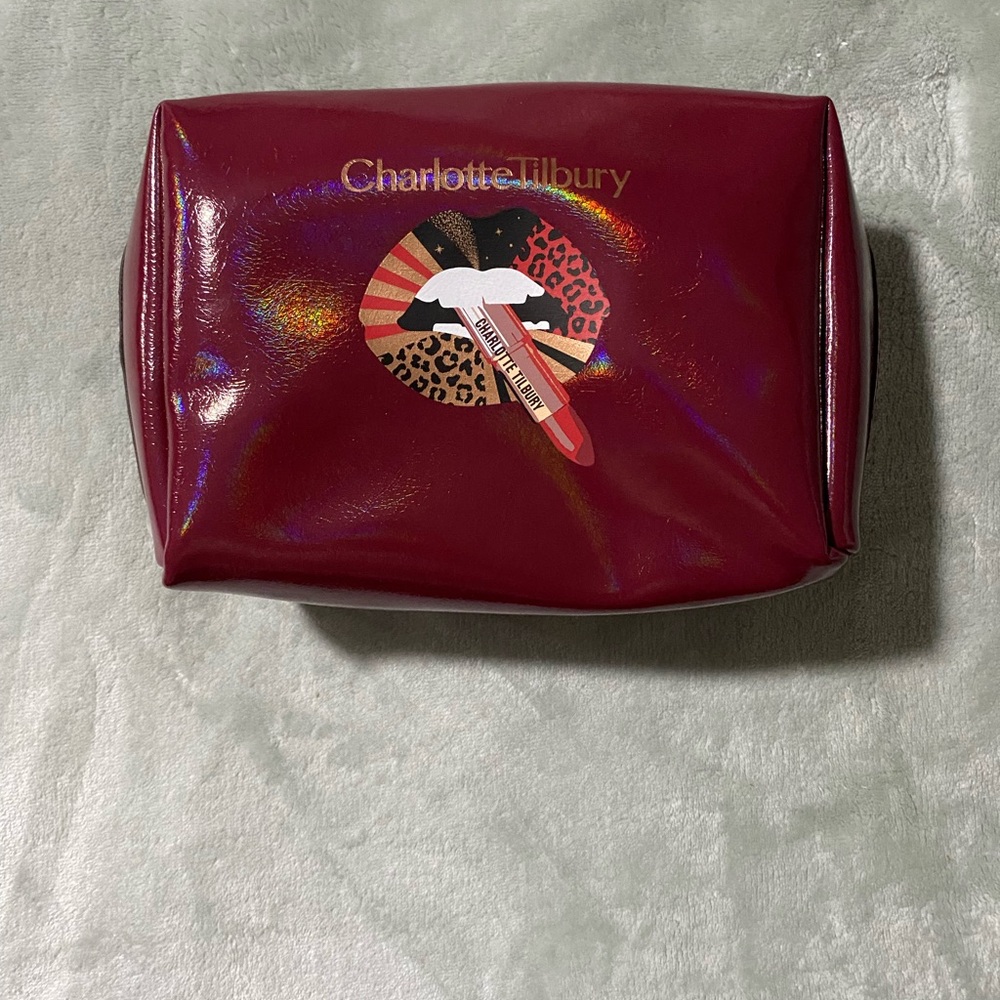 Charlotte Tilbury Burgundy Cosmetic Bag with Gold Accents
